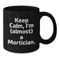 Mortician Humor Gifts from Friends for Men, 'Keep Calm, I'm (almost) A Mortician.' Black Coffee Mug, Graduation Unique Gifts - Additional