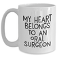 Funny Oral Surgeon Gifts from Mom, Heart Belongs to a White Coffee Mug for Oral Surgeon, My Heart Belongs To An Oral Surgeon Quote, Mother's Day Unique Gifts - Main