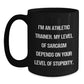 Funny Athletic Trainer Gifts for Men from Friends - Black Coffee Mug - 'I'm An Athletic Trainer. My Level Of Sarcasm Depends On Your Level Of Stupidity. - Main