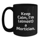 Mortician Humor Gifts from Friends for Men, 'Keep Calm, I'm (almost) A Mortician.' Black Coffee Mug, Graduation Unique Gifts - Main