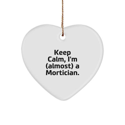 Mortician Humor Gifts from Friends and Family - Keep Calm I'm (almost) A Mortician. Heart Ornament for Christmas - Image 1