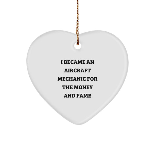 Aircraft Mechanic Gifts from Friends - 'I Became An Aircraft Mechanic For The Money And Fame' Funny Heart Ornament for Christmas - Image 1