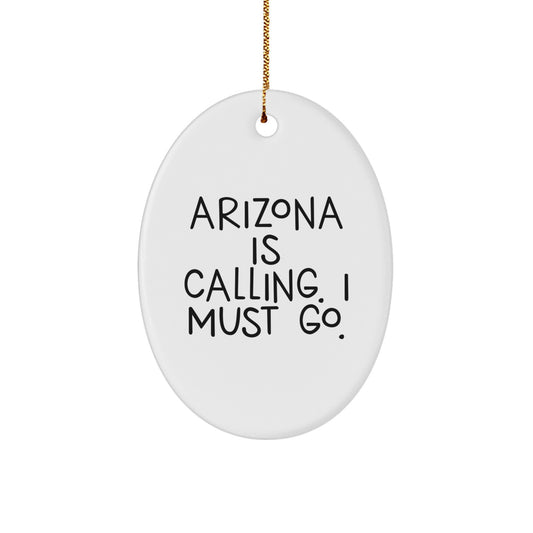 Arizona Oval Ornament, 'Arizona Is Calling. I Must Go.' Quote, White, Oval Shaped, Ideal Gifts for Arizona Lovers, Friends, and Family, Christmas Unique Presents - Image 1